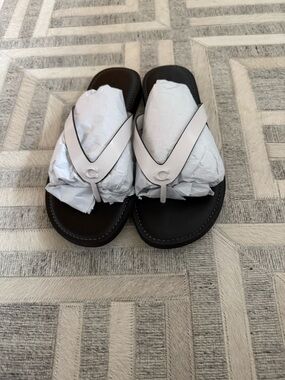White Leather Coach Thong Sandals with Subtle Logo Accent